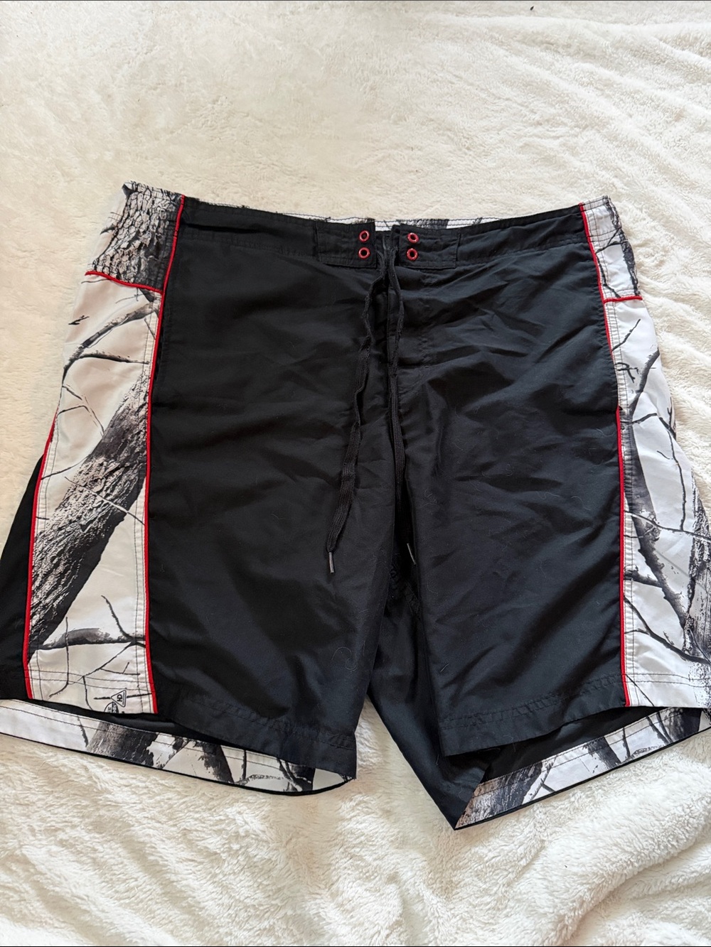 Quiksilver Black Swim Board Shorts with White Tree-Print Panels and Red Piping